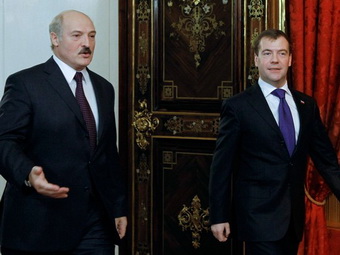 Russia's President Dmitry Medvedev (R) a